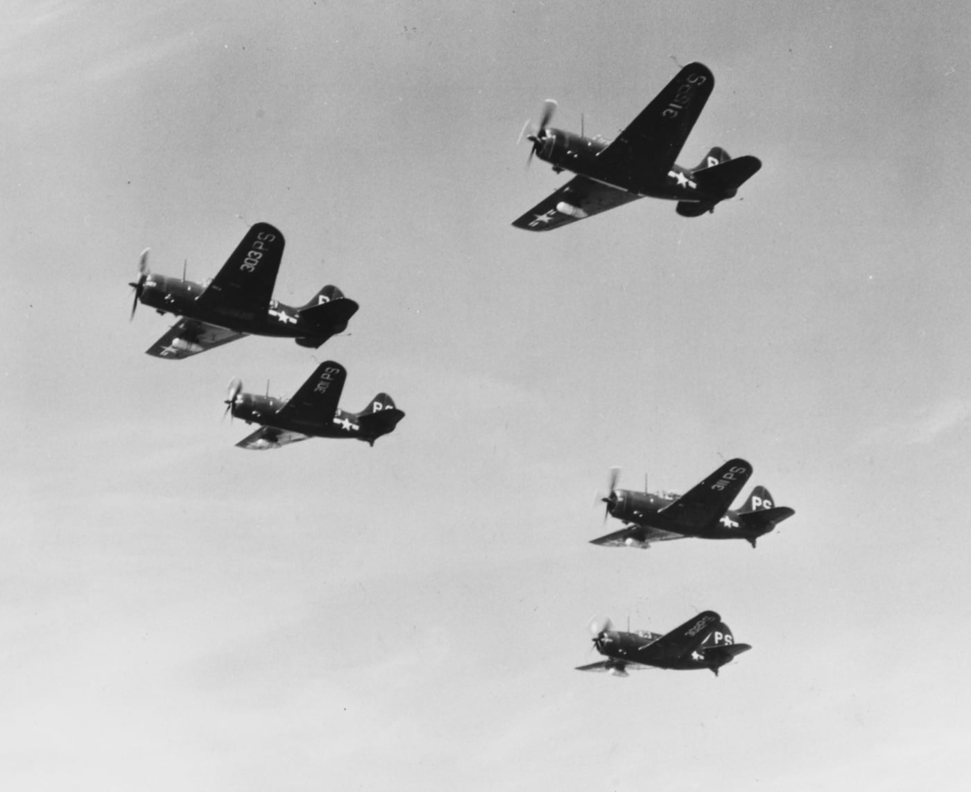 US Navy Curtiss SB2C Helldivers from USS Philippine Sea in flight