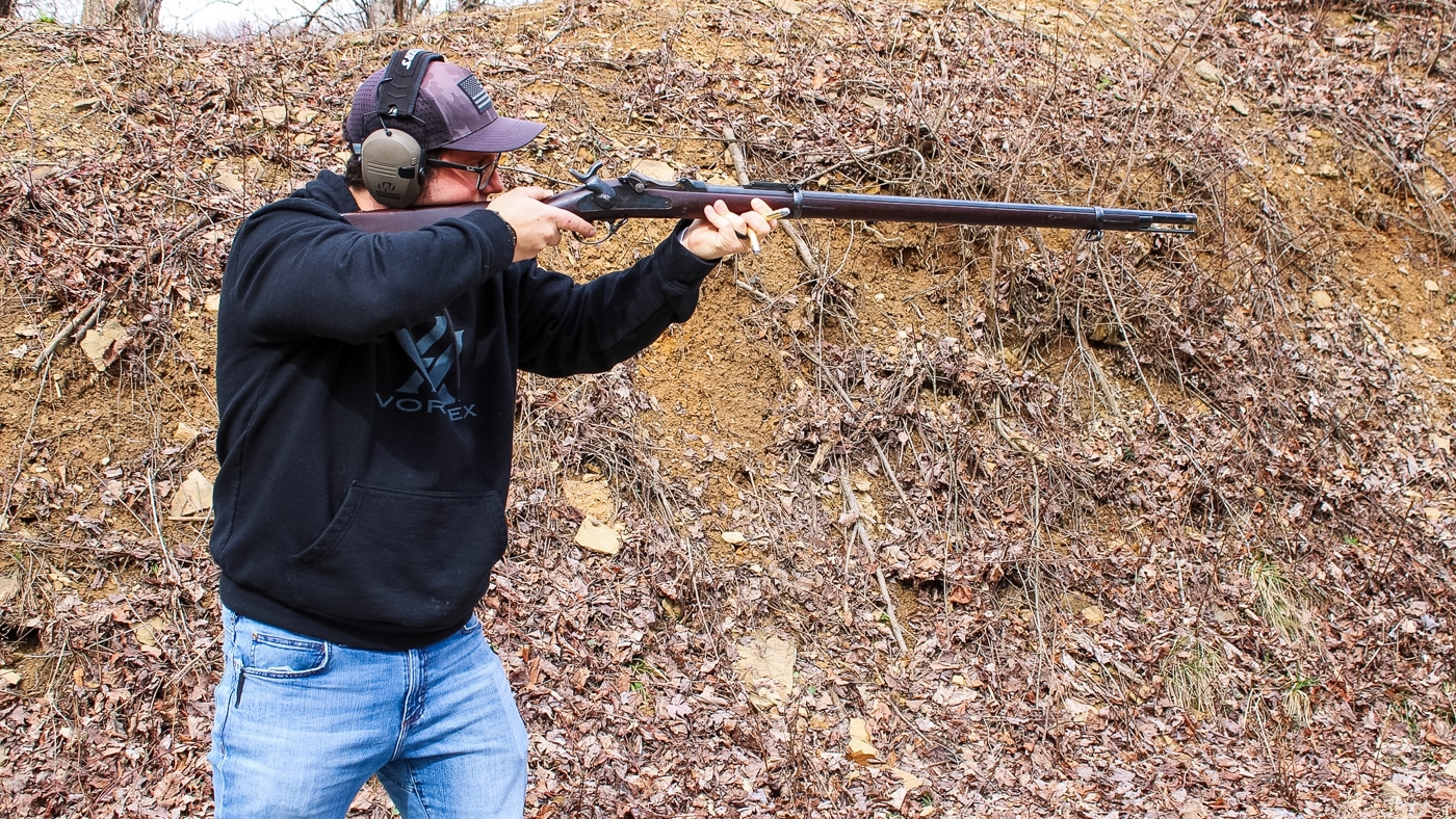 author prepares to shoot the trapdoor rifle