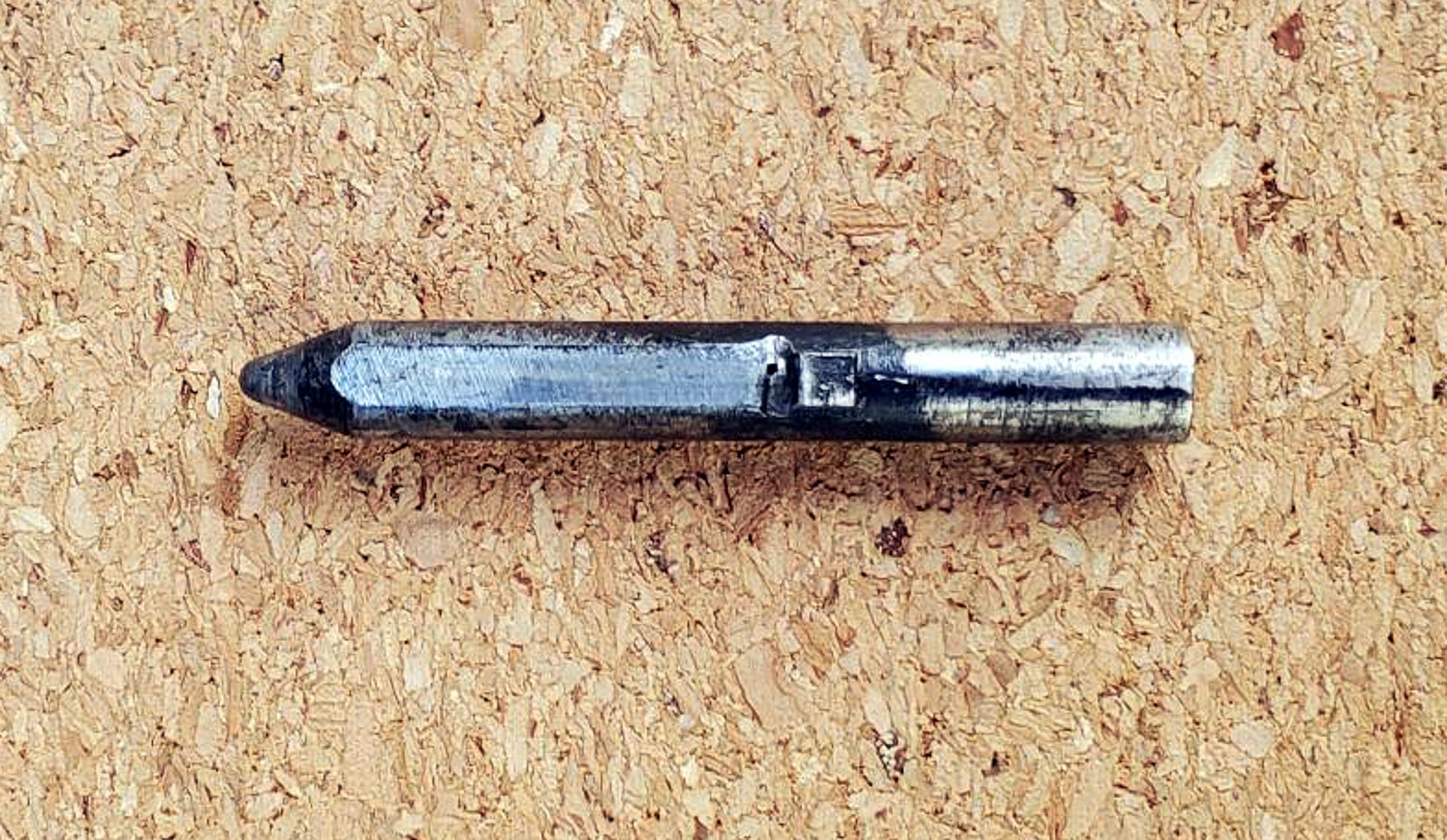 Fritz Mann striker with conical tip