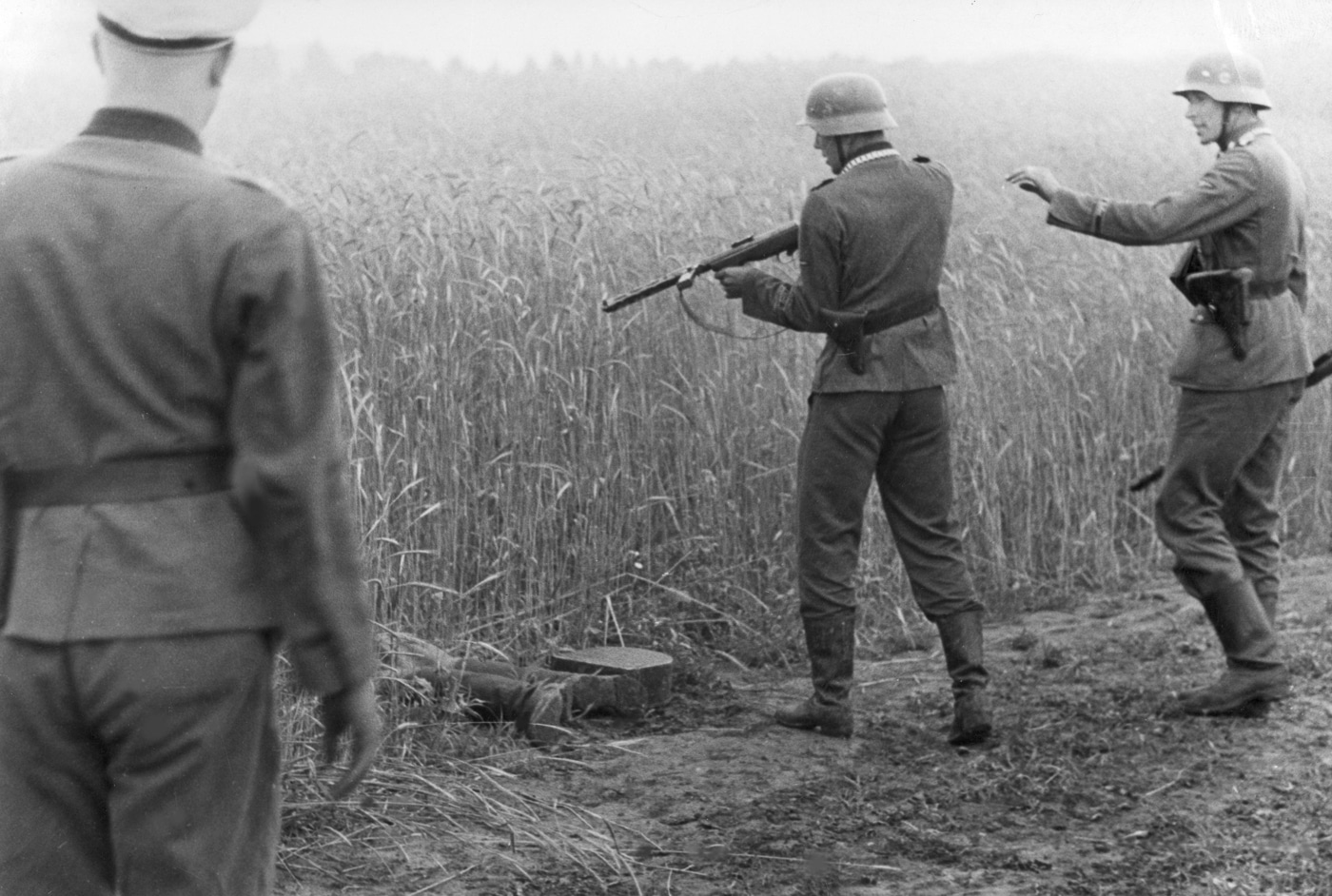 German Feldgendarmerie and SS troops execute a civilian in Eastern Europe