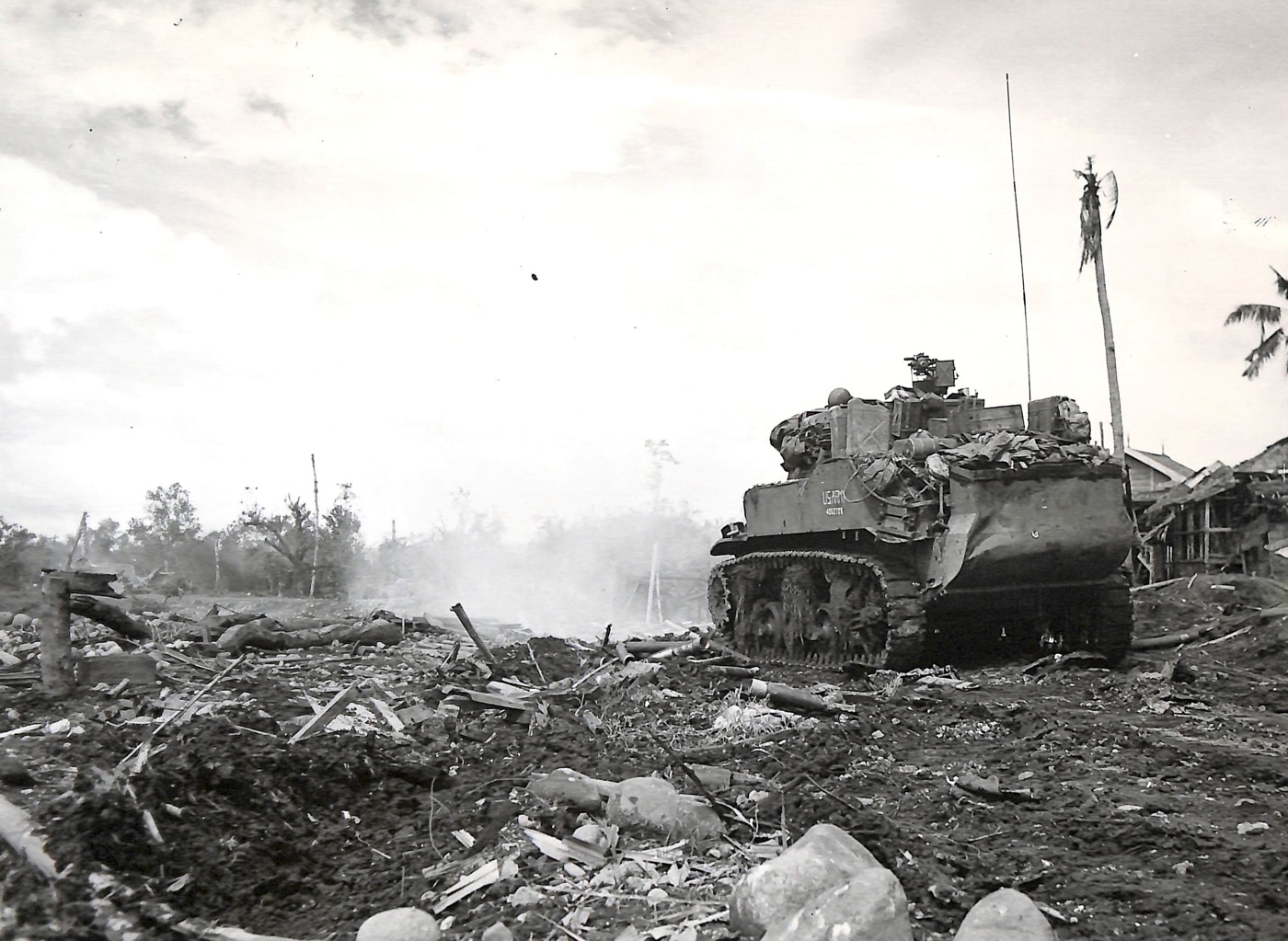 M8 fires on a Japanese pillbox on Ormoc Leyte Island Philippines