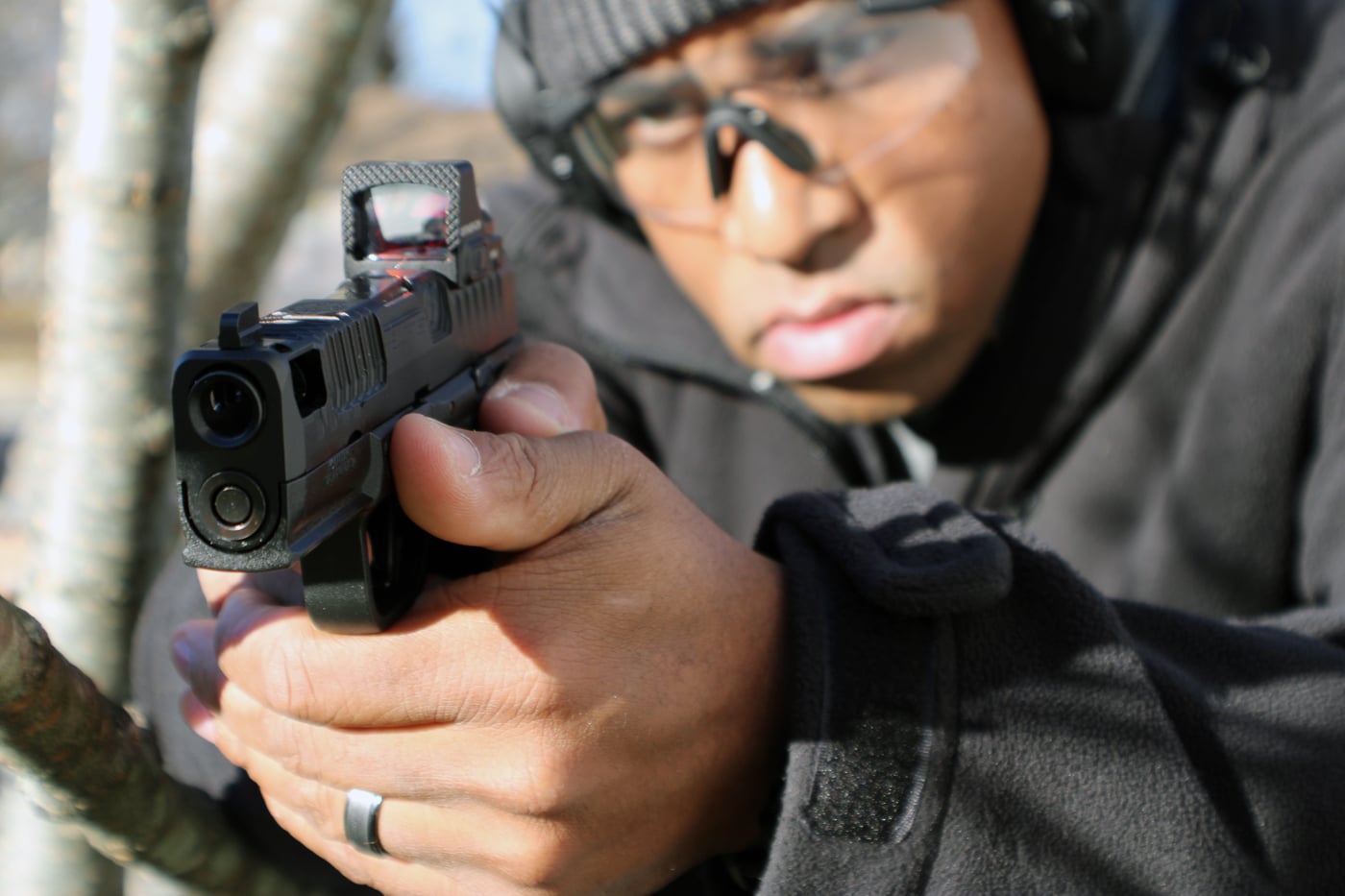 author test shooting the Floyd Custom Hellcat Pro pistol on the shooting range