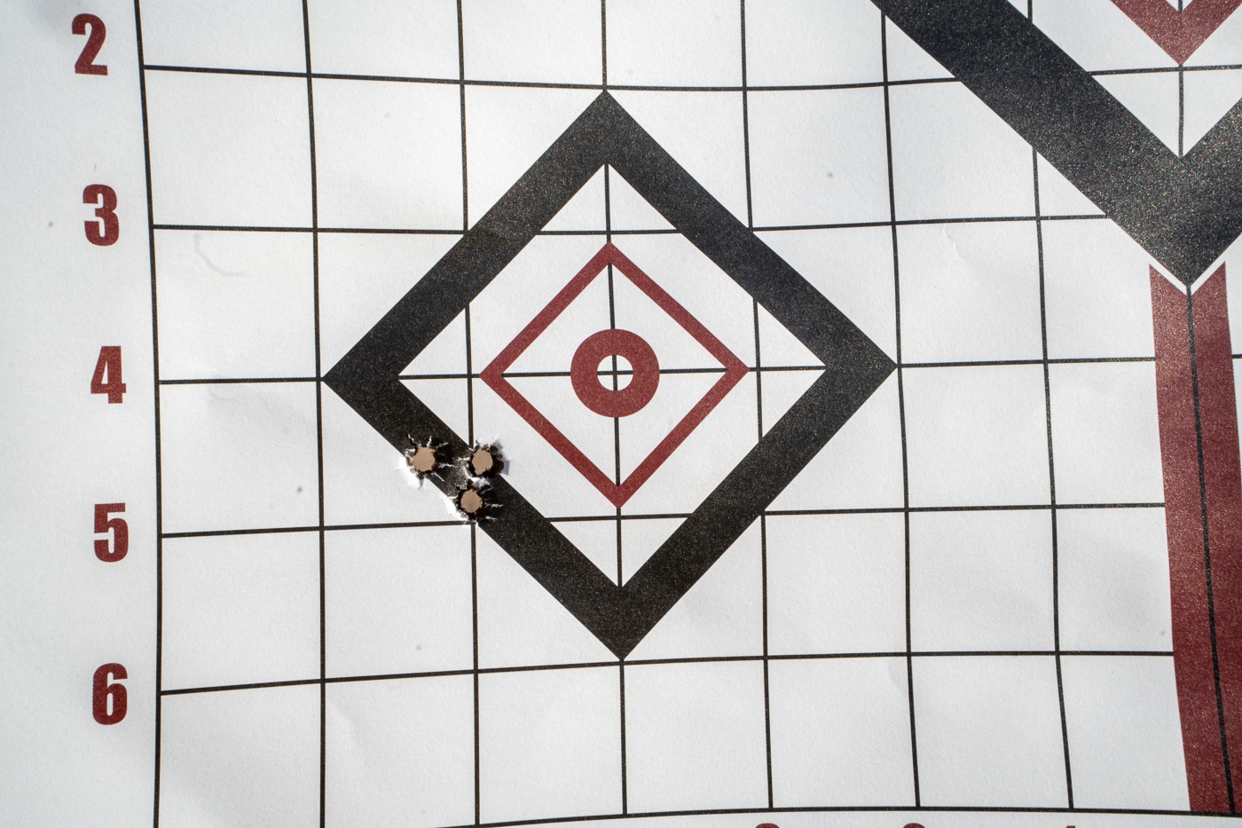 tight shot group on paper target showing precision and accuracy of Springfield Heatseeker with Samson SAS folding stock