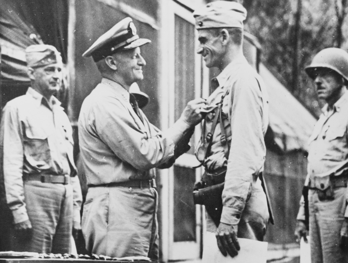 Adm Chester Nimitz presents Guadalcanal Medal to Lt Col Carlson of Second Marine Raiders