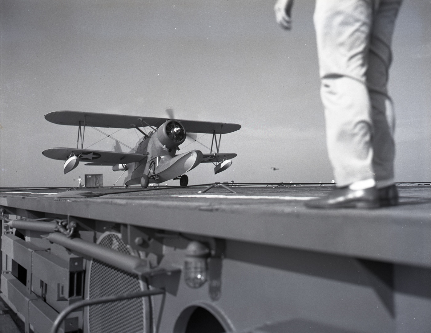 J2F Duck landing on the USS Charger AVG-30 during 1942