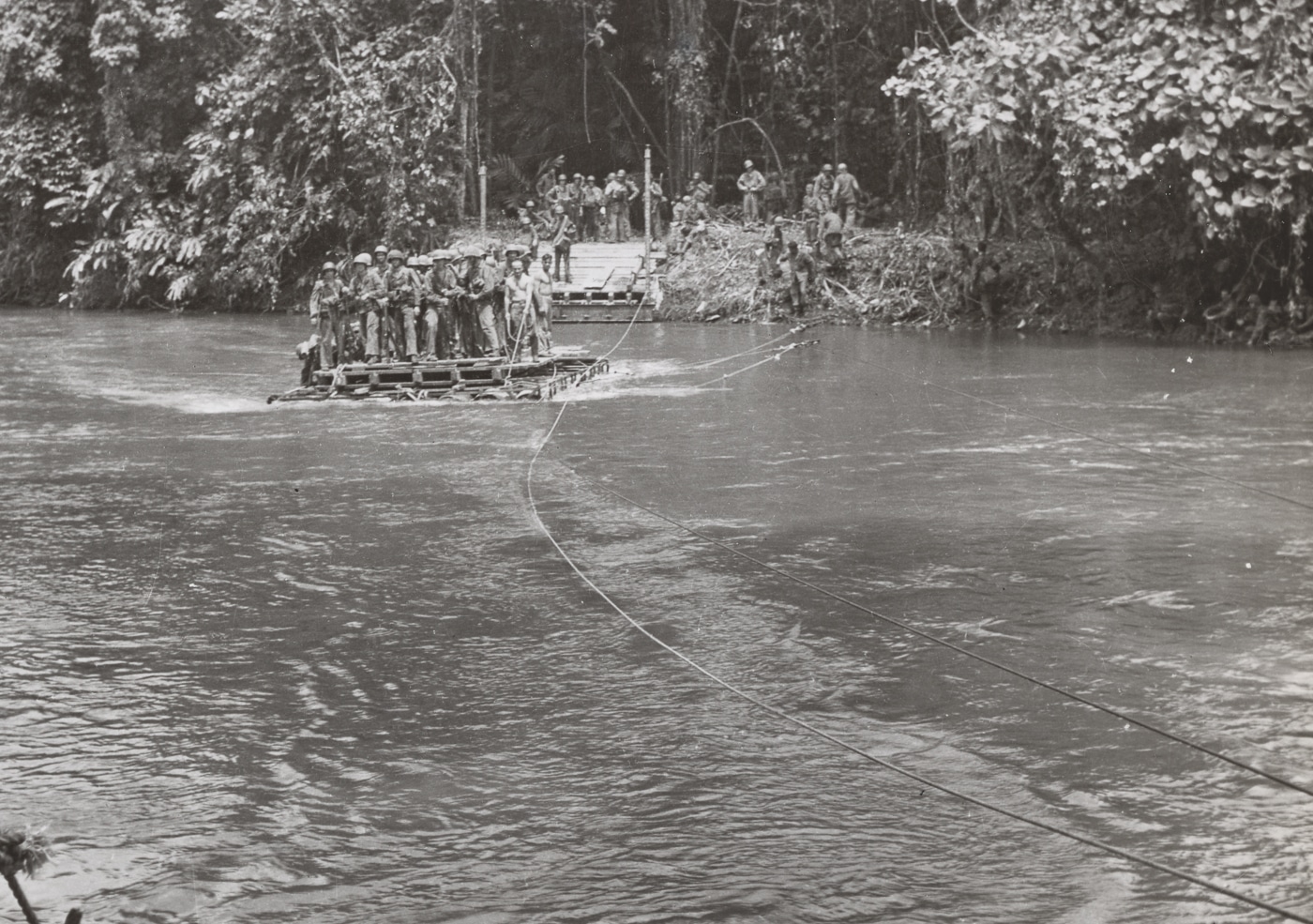 Marine engineers built a ferry across a river on Guadalcanal
