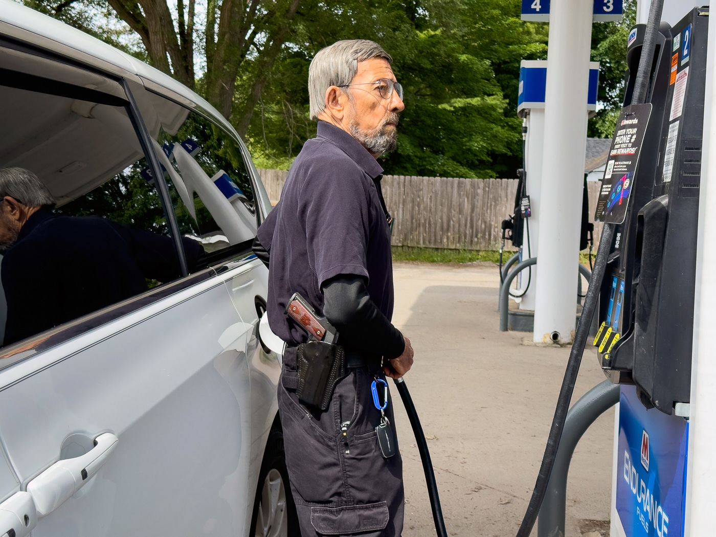 Massad Ayoob demonstrates open carry at gas pumps