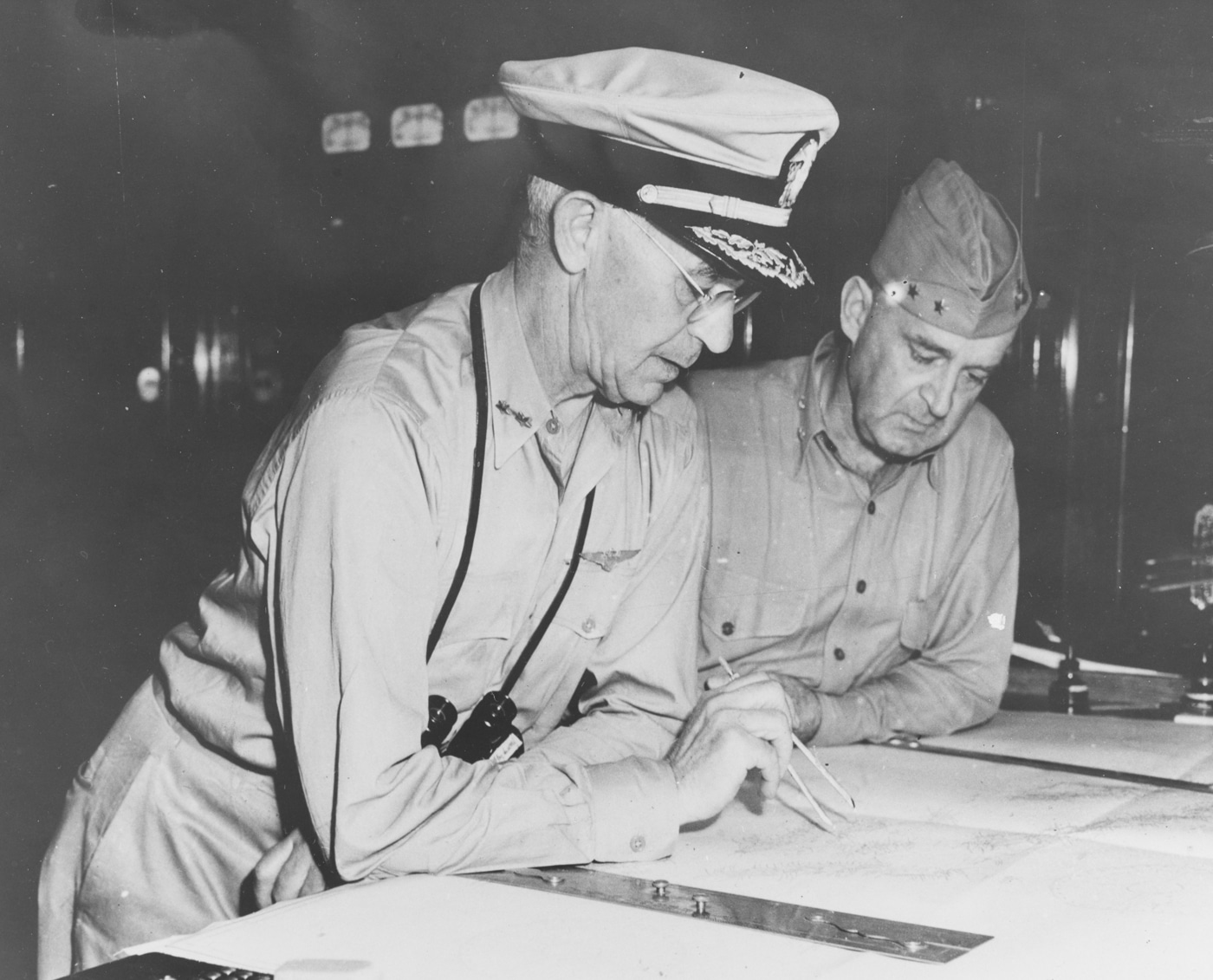 Rear Adm Richmond Kelly Turner and Maj Gen Alexander Vandergrift on USS McCawley AP-10 during Guadalcanal Campaign