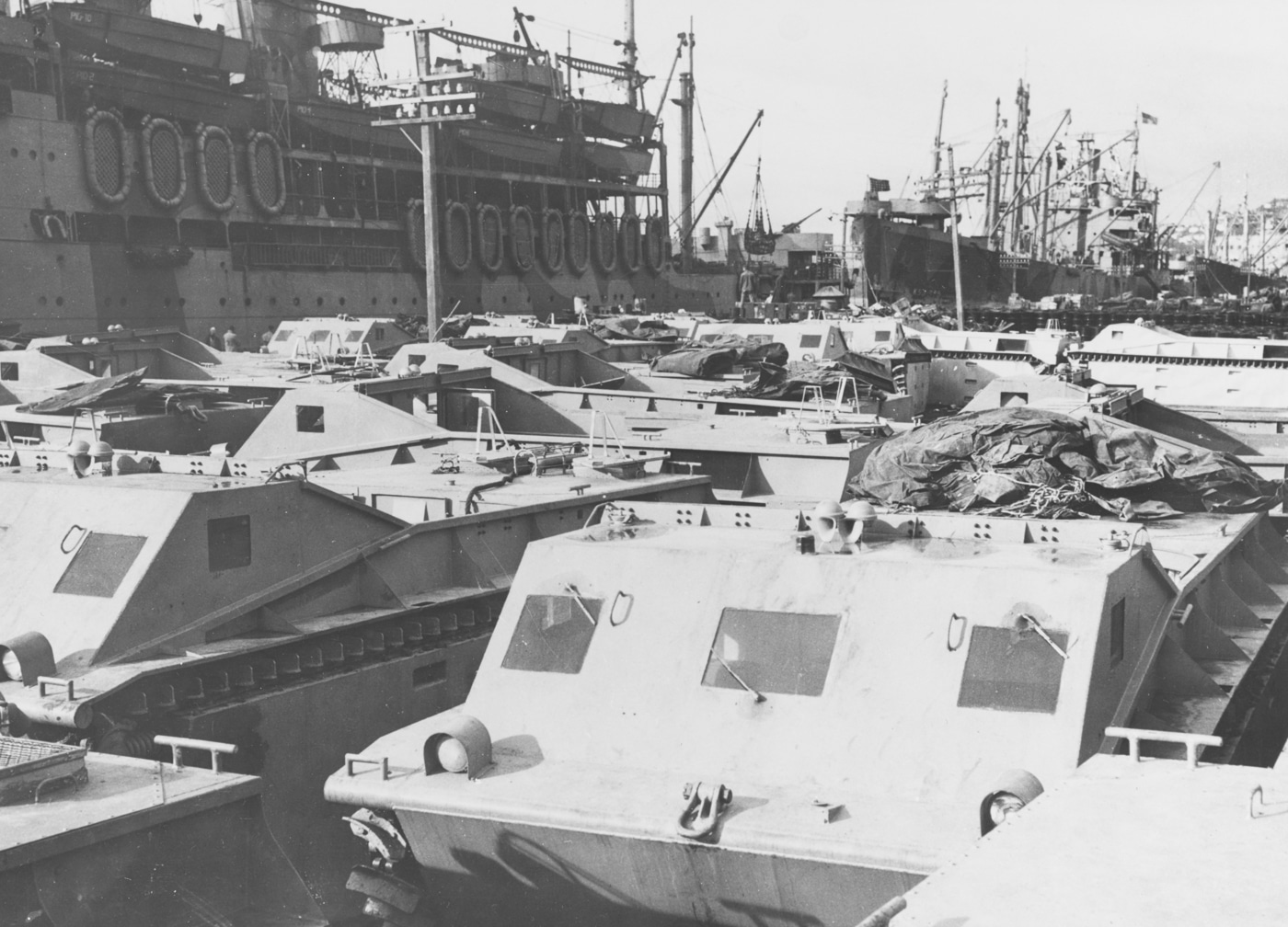 US Marine Corps LVT amphibian tractors on the dock at Wellington New Zealand awaiting embarkation on board ships of the Guadalcanal invasion force