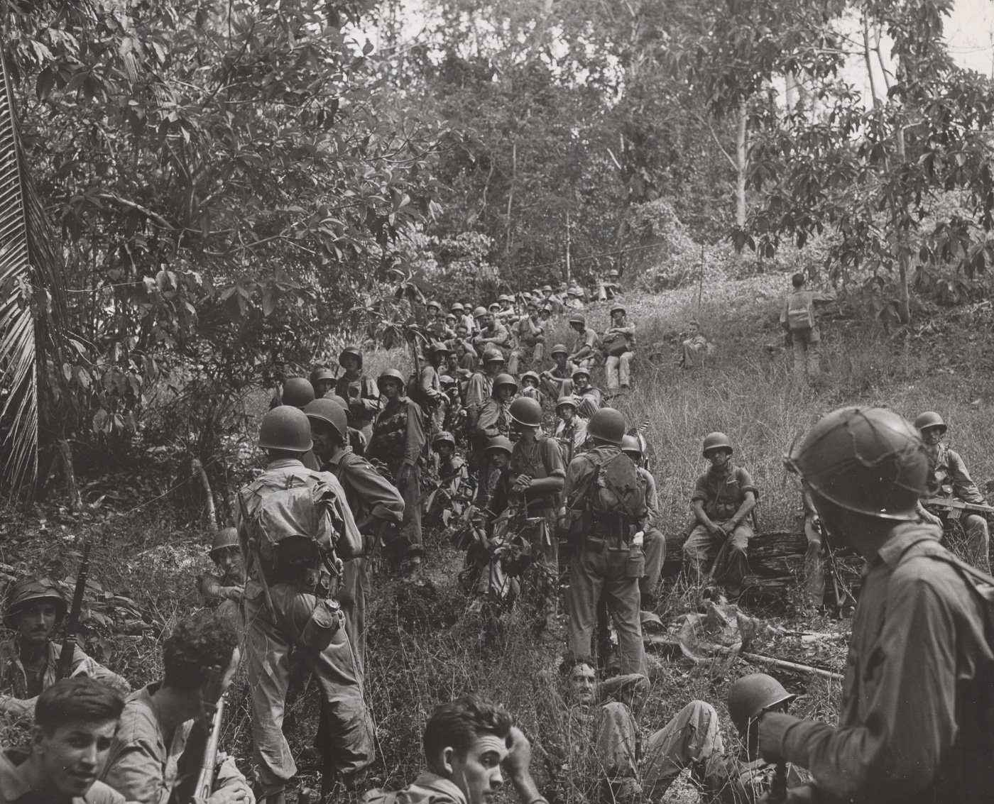 US Marines pause during movements on Guadalcanal