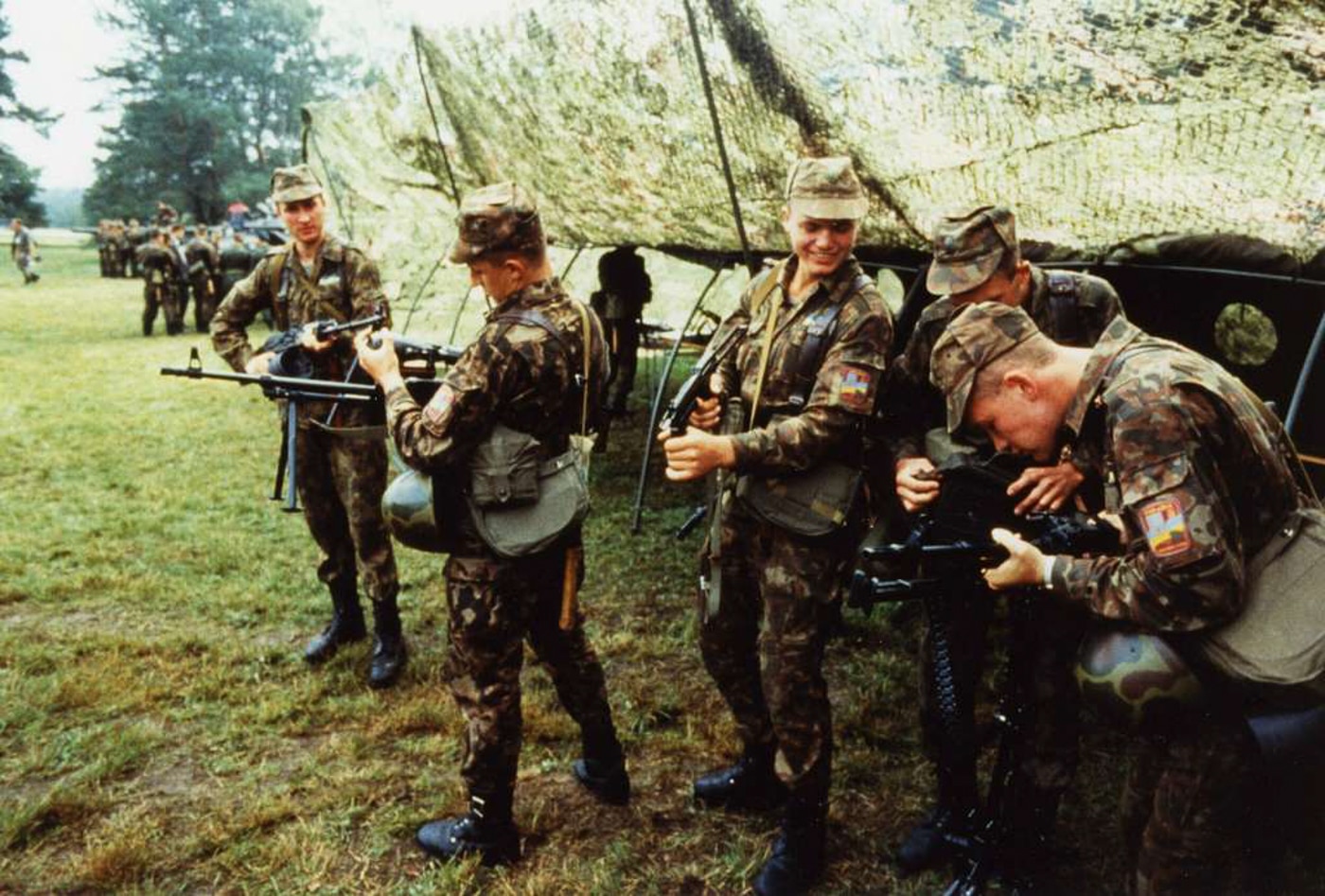 Ukrainian soldiers armed with PM-63 and other firearms