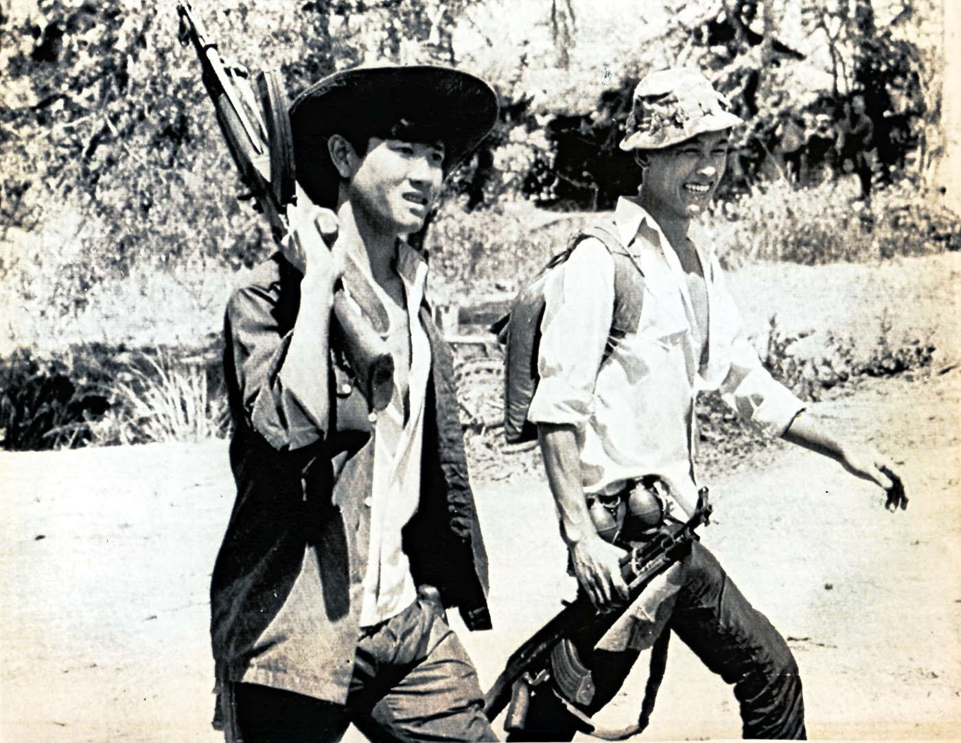 Viet Cong fighters armed with AK-47 rifles in Cai Lay