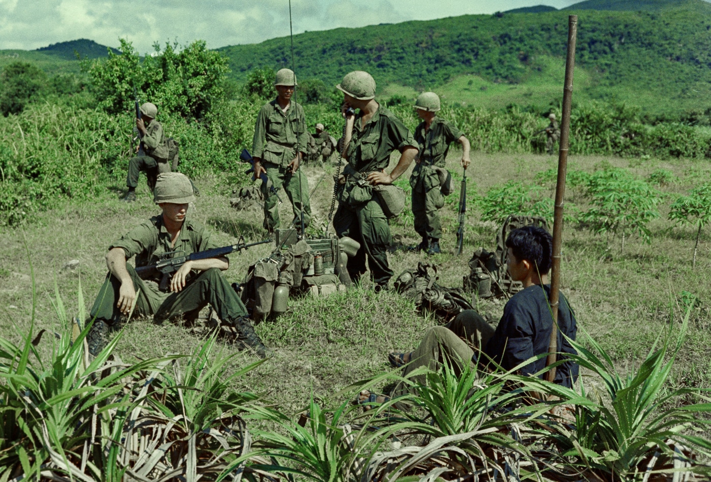 Viet Cong guerrilla captured by US troops during Operation Cook