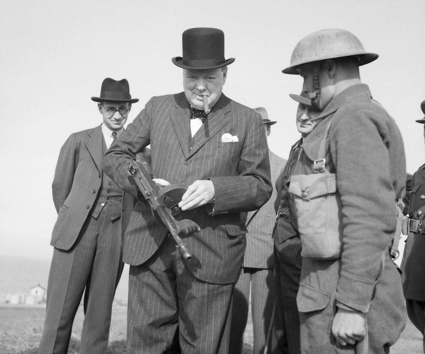 Winston Churchill handles a Thompson SMG during an inspection of invasion defenses in 1940