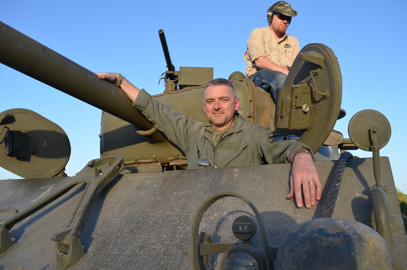 author driving a Sherman tank