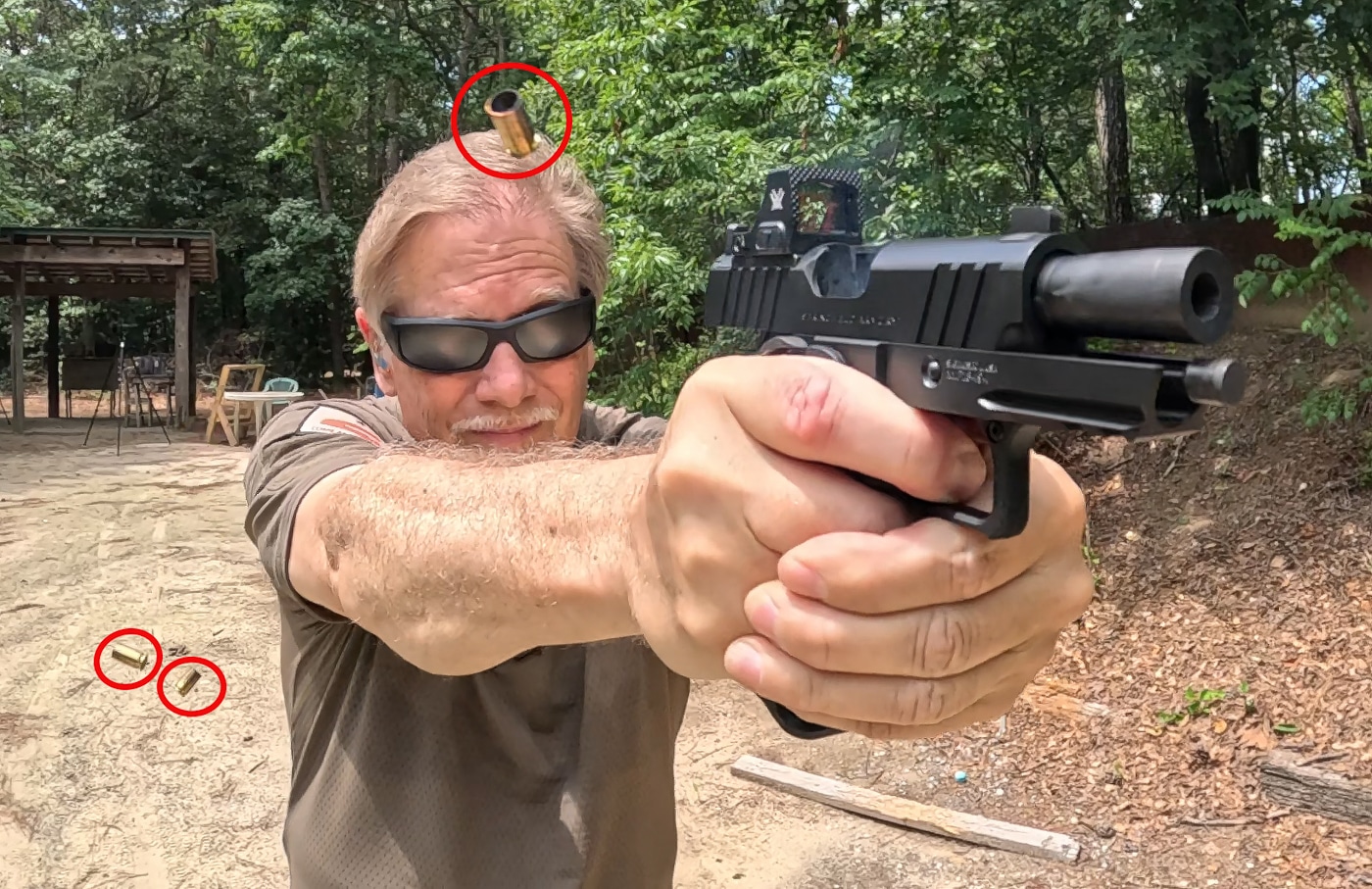 author getting a solid grip on the Prodigy pistol allowing him to control recoil when shooting