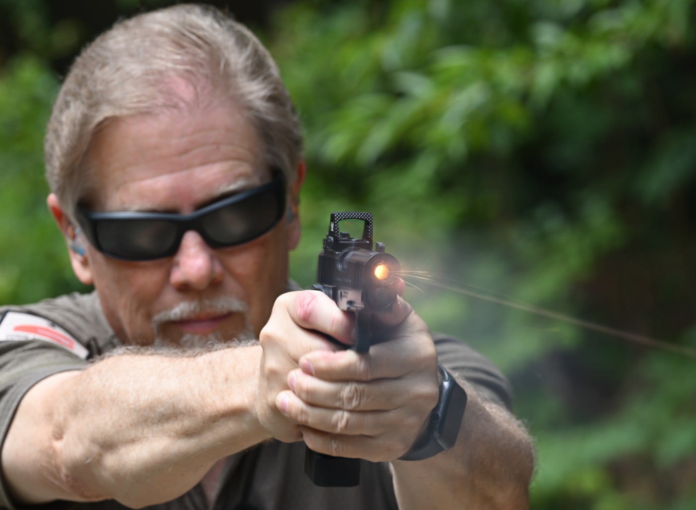 author shooting the 1911 Prodigy 3 point 5 inch model