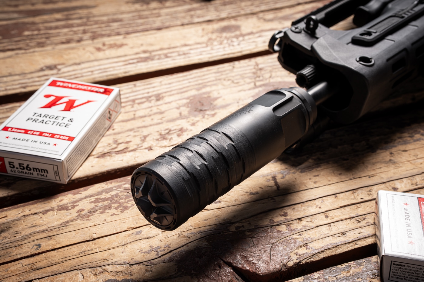 close up view of JK Armament 172 PRO-KOR 556K Suppressor mounted on Springfield Hellion