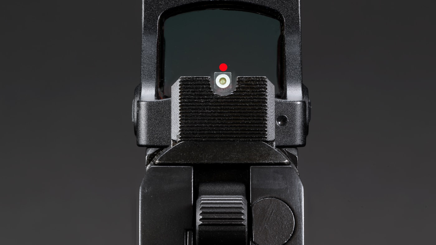 cowitnessing the sights through the red dot sight optic