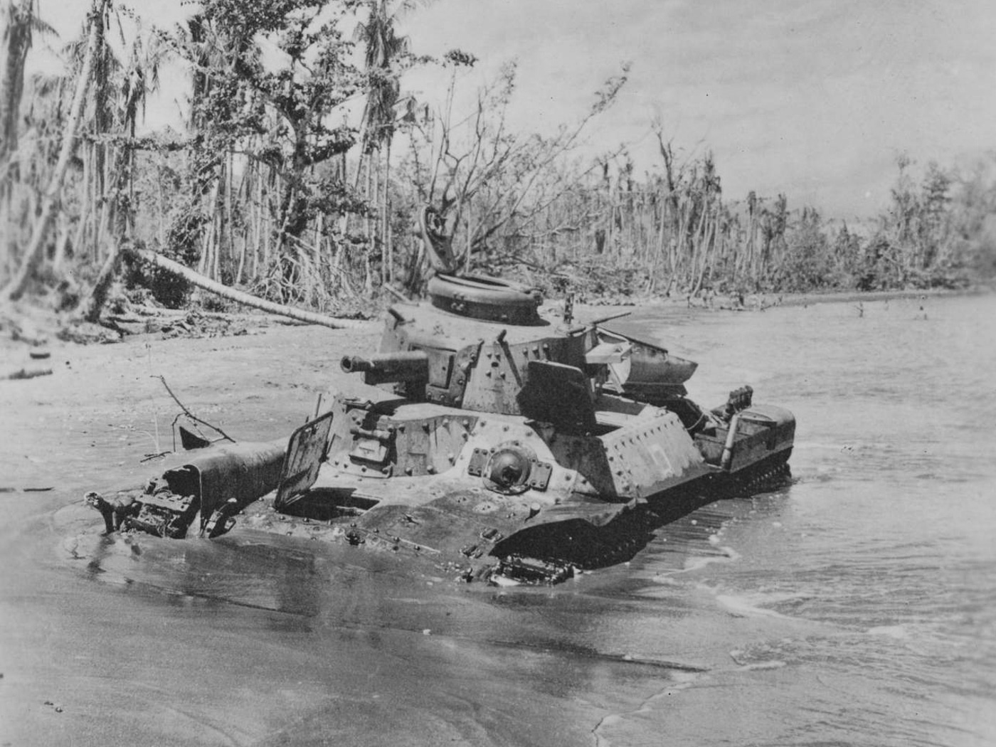 destroyed Japanese Type 97 Chi-Ha tank on Guadalcanal beach