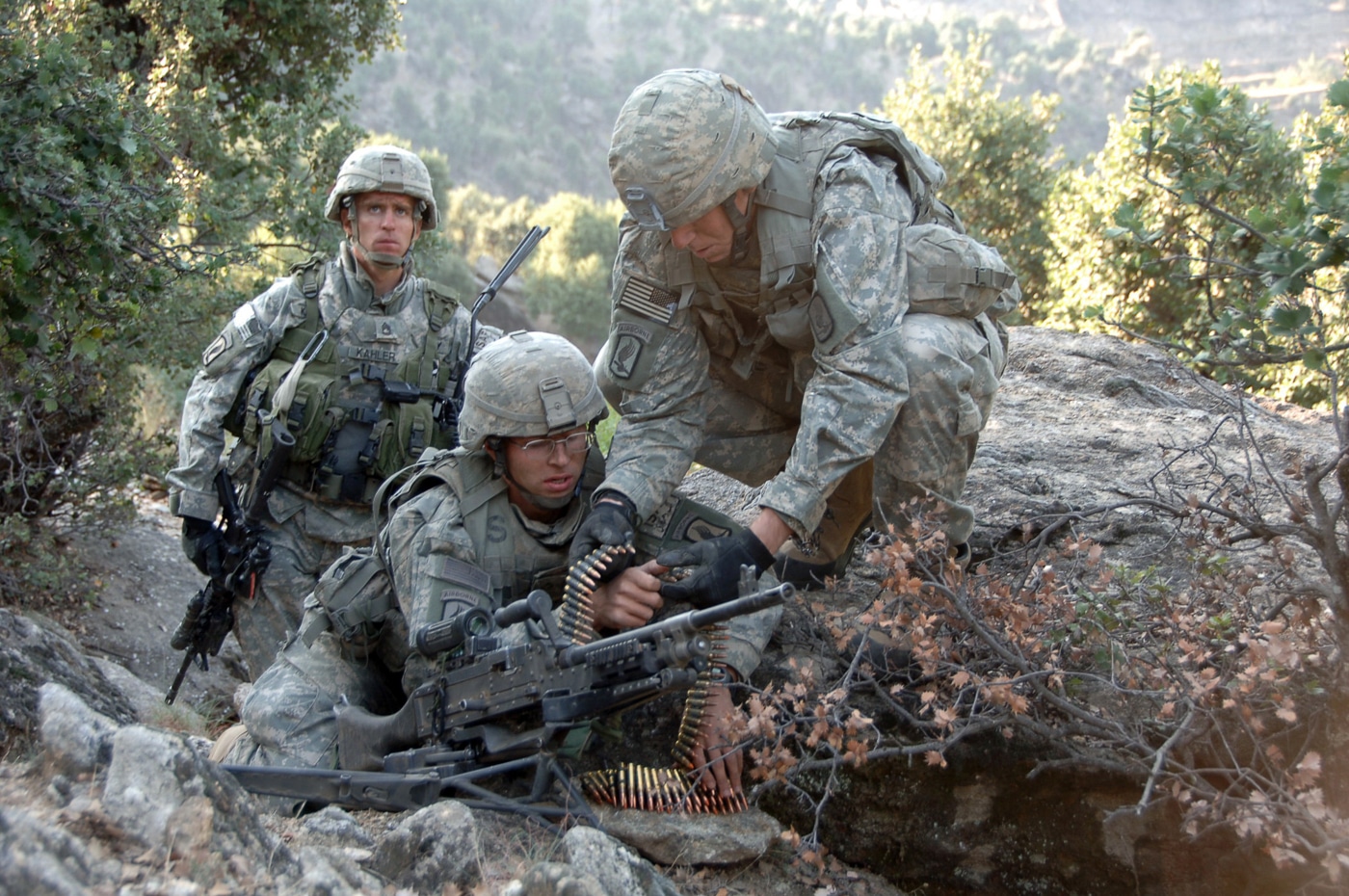 machine gun team sets up M240 in Kunar Province Afghanistan