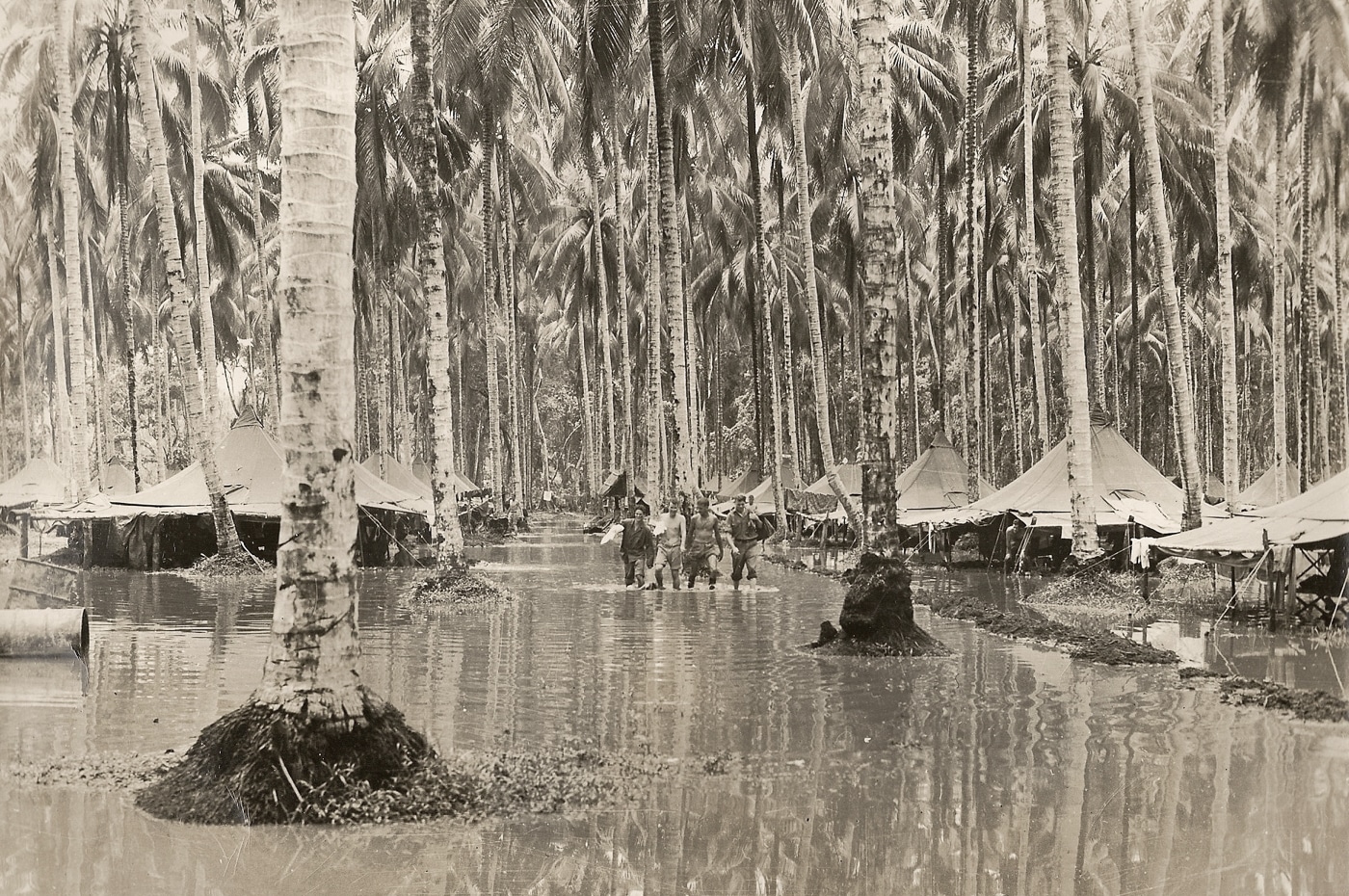 rain floods Marine camp on Guadalcanal