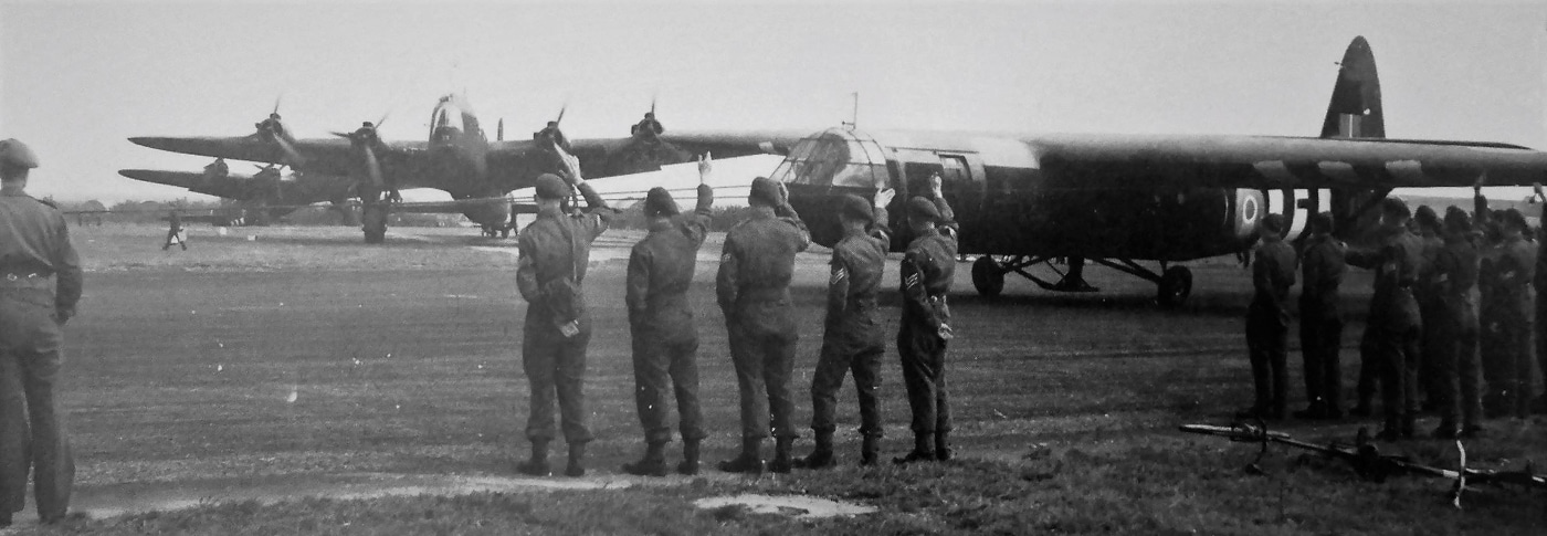 British paratroopers waving by to Airspeed AS-51 Horsa-7 towed by a Short Stirling Mk-IV heading for Arnhem September 1944