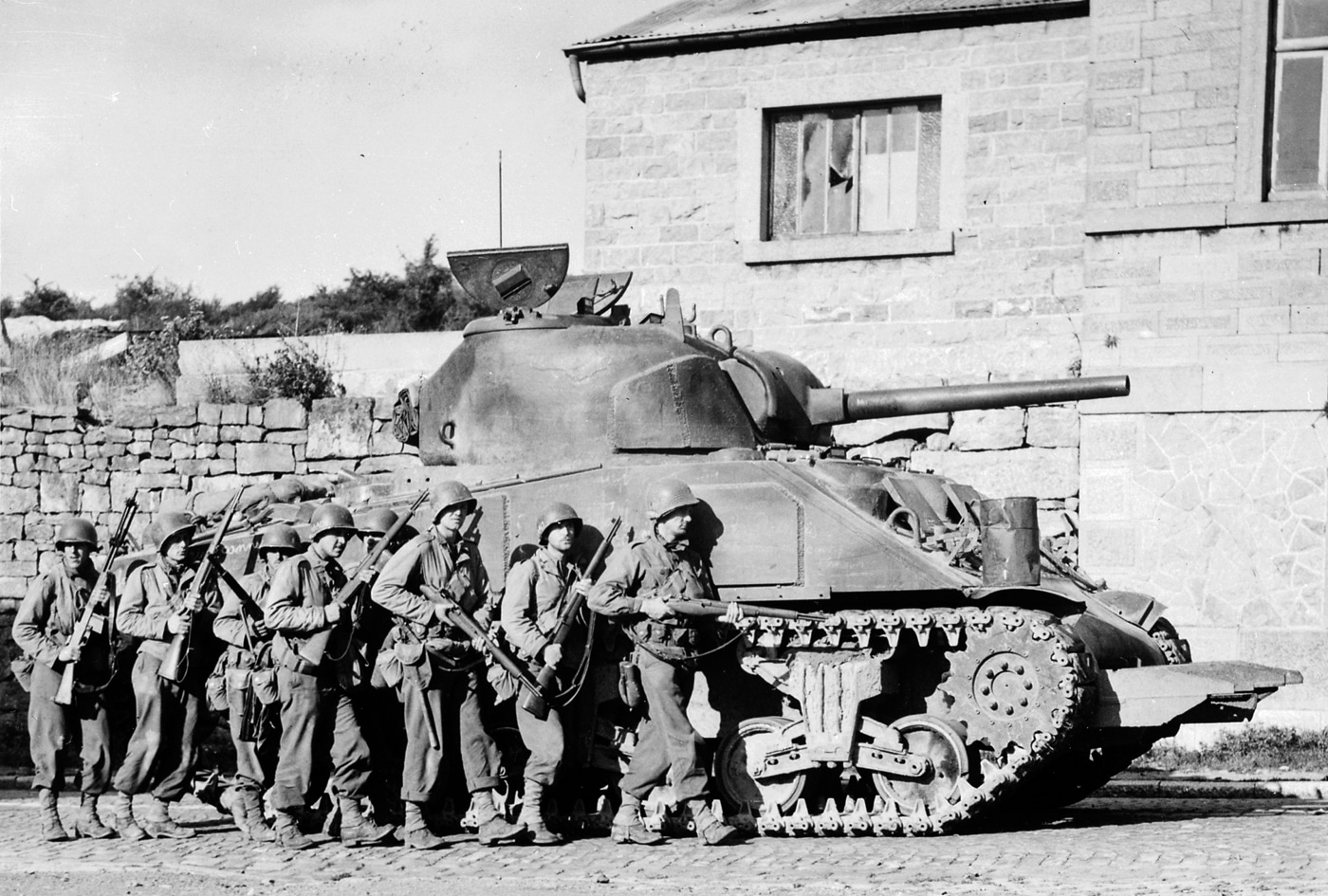 M4 Sherman with infantry in Belgium during September 1944