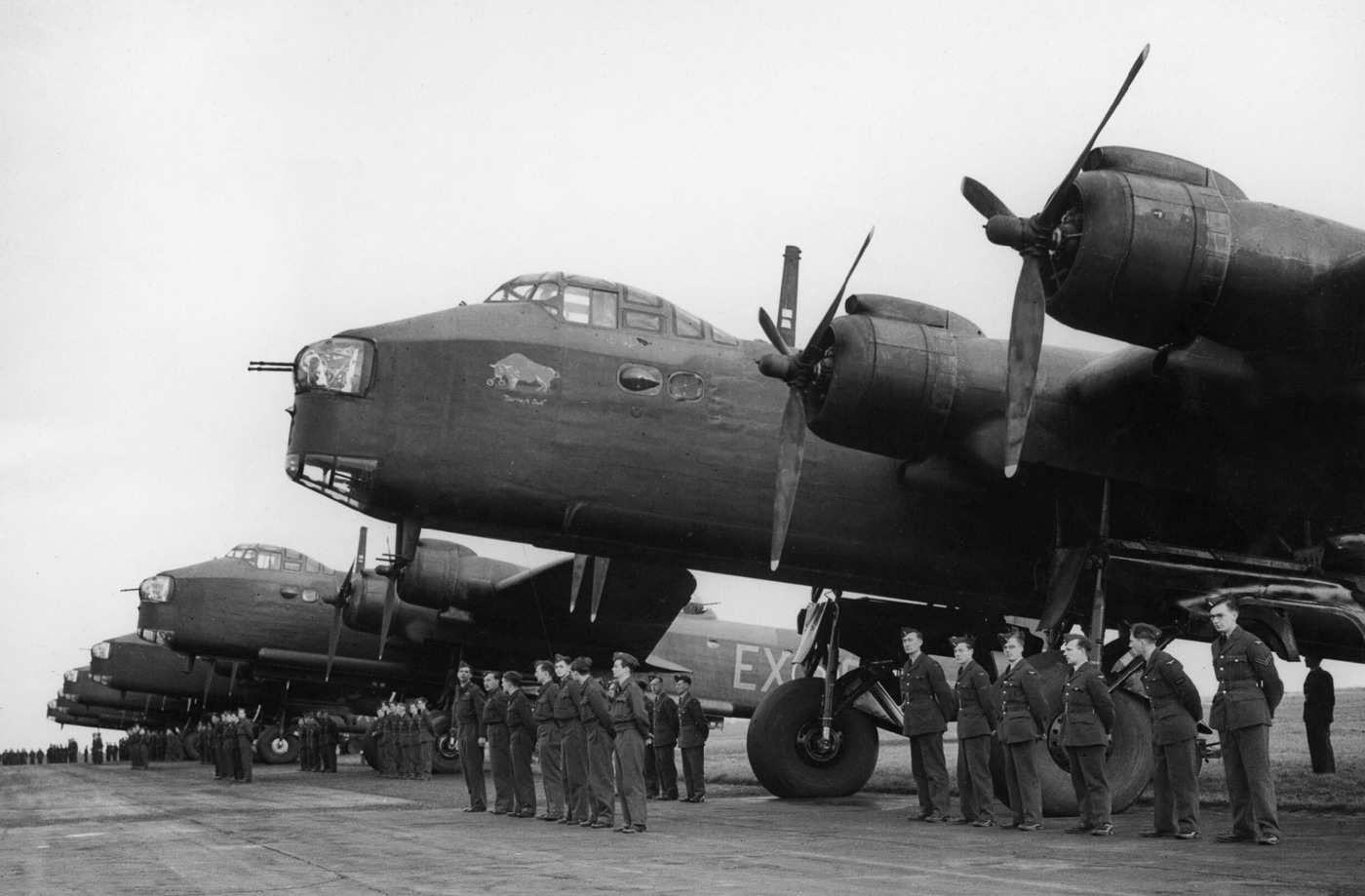 Short Stirling air and ground crews photographed with their planes during an official visit by the Duke of Gloucester