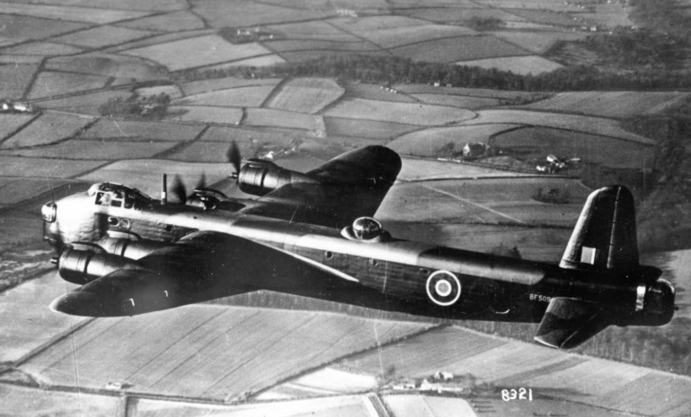 Short Stirling in flight over British countryside