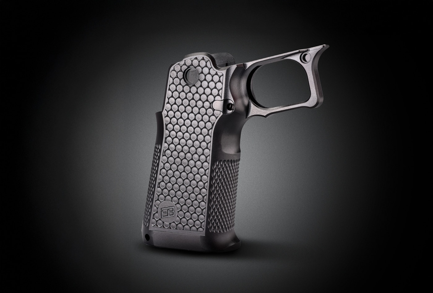 circular-pattern texturing on the sides of the grip module