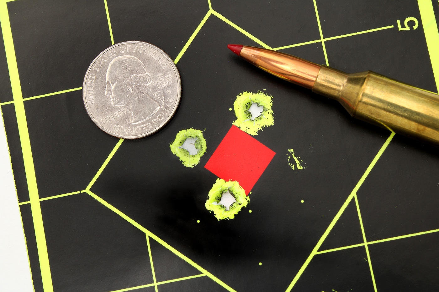 tight group on shooting target from ammunition consistency