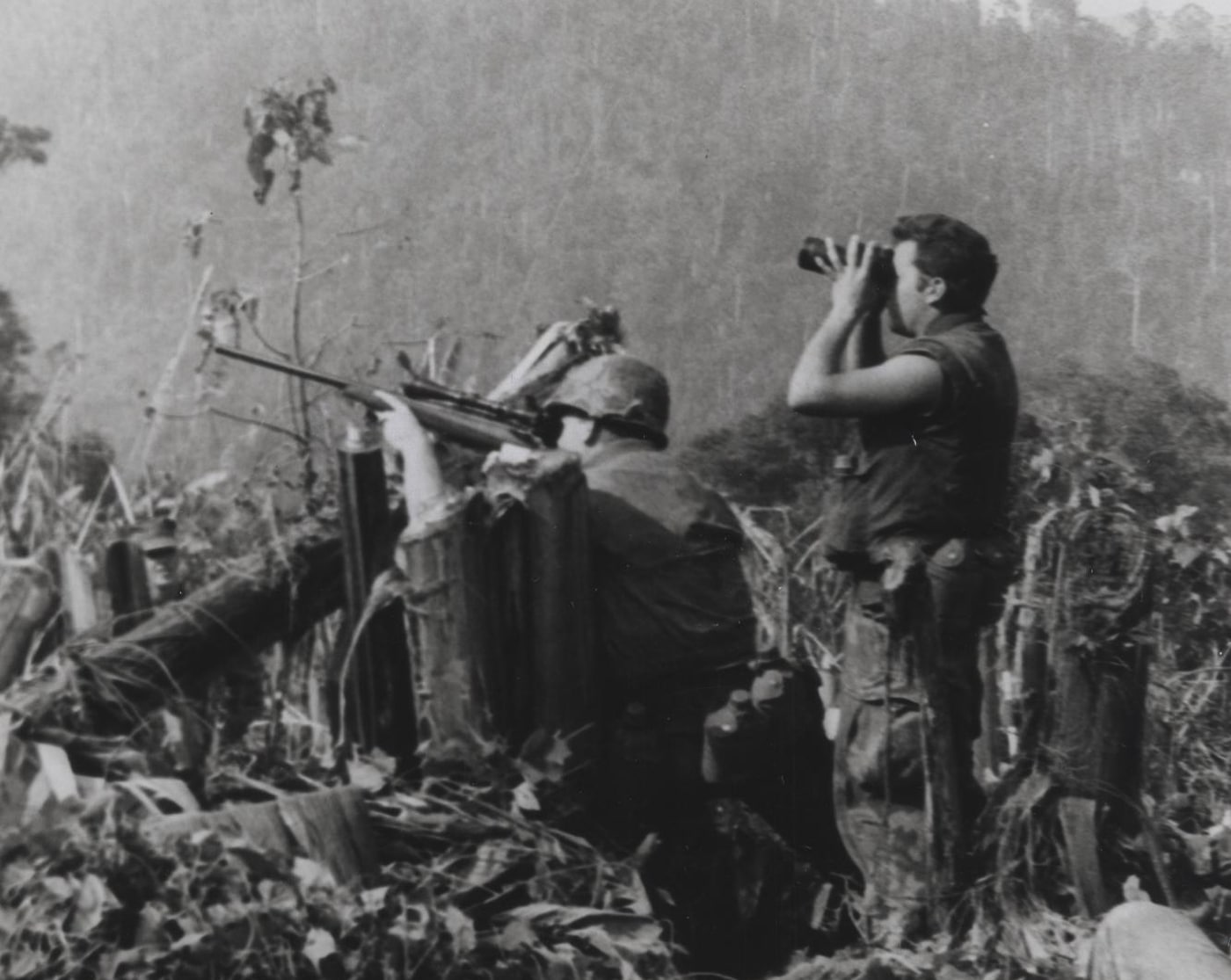 Marine sniper team engages enemy during Operation Dewey Canyon in Vietnam War