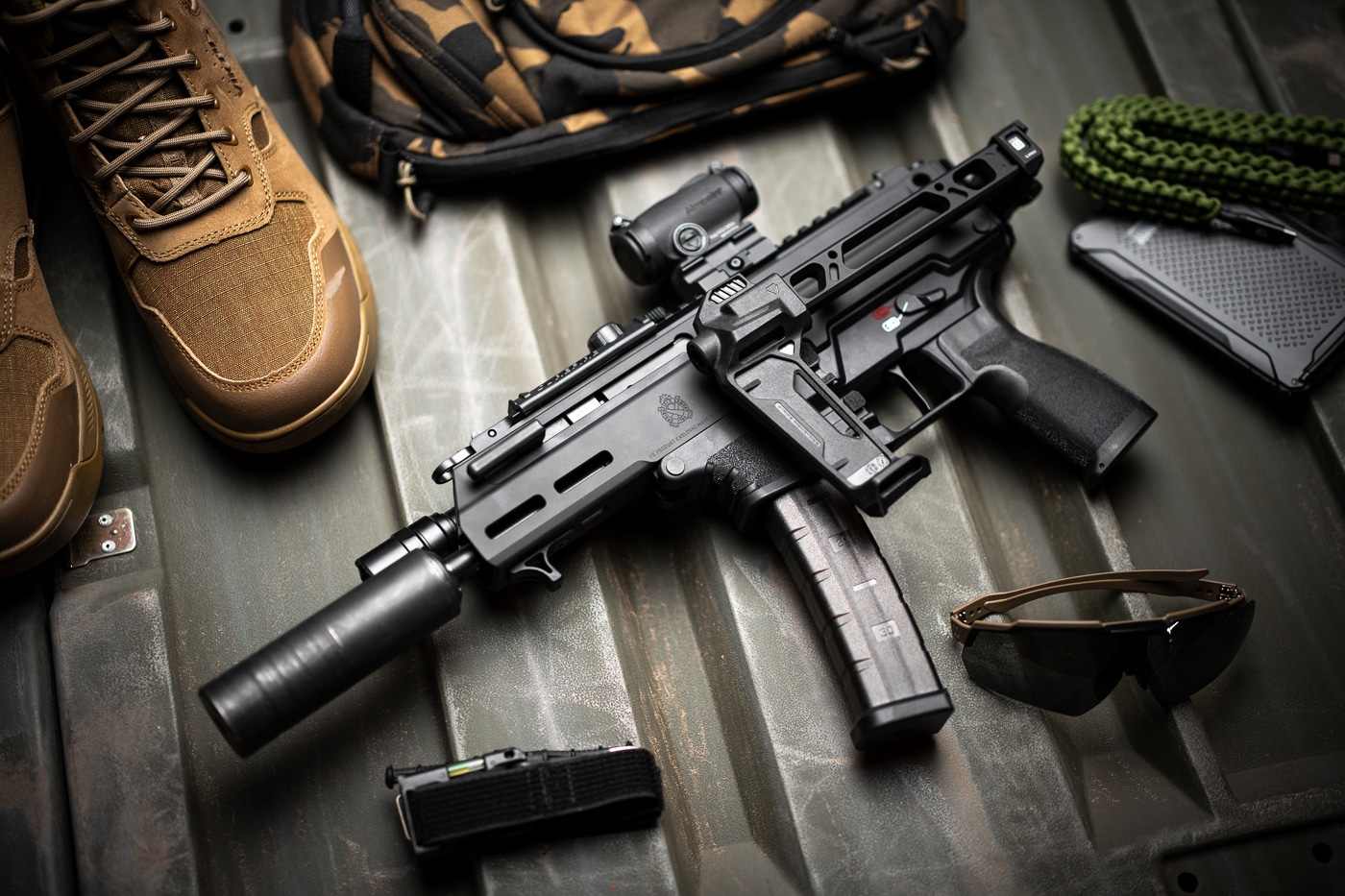 Springfield Armory Kuna pistol with folded arm brace and 9mm suppressor