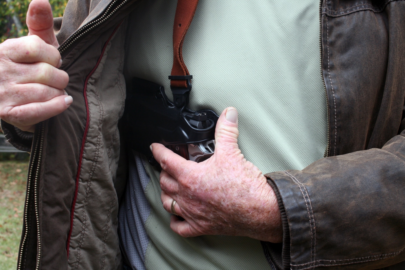a shoulder holster may provide faster access when heavy clothing is worn