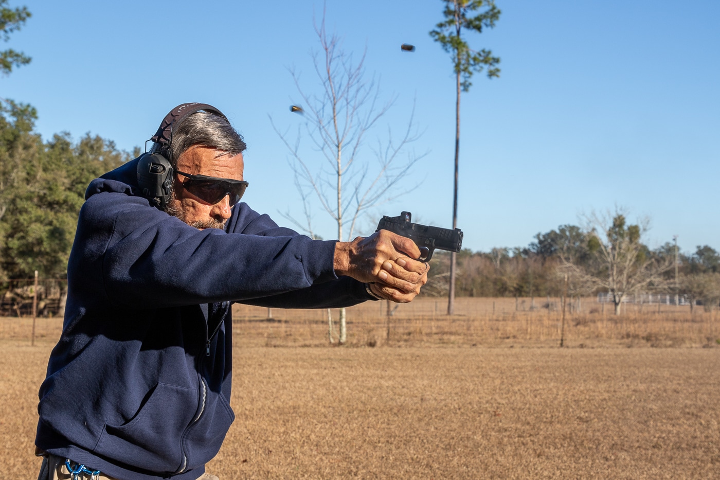 aggressive forward posture helps to control recoil