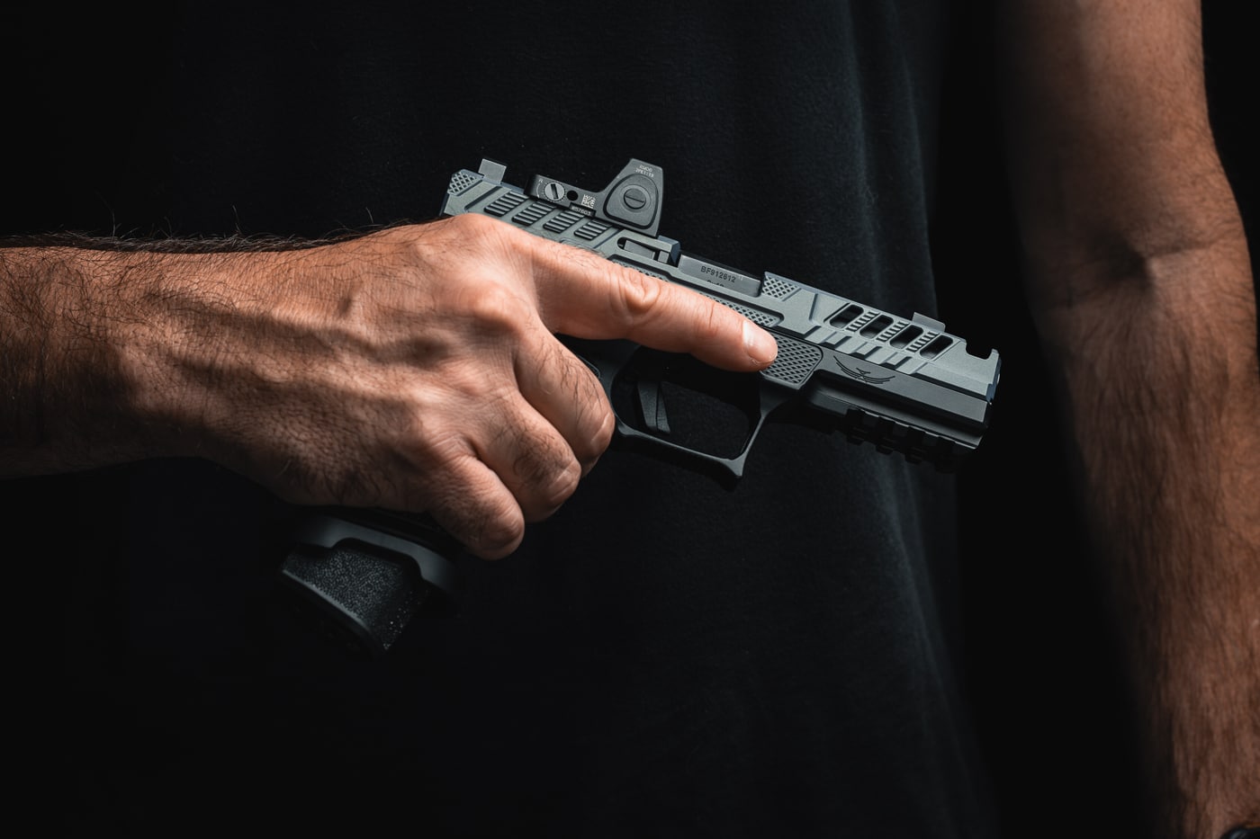 author obtains firing grip on the custom handgun built with the Springfield COG