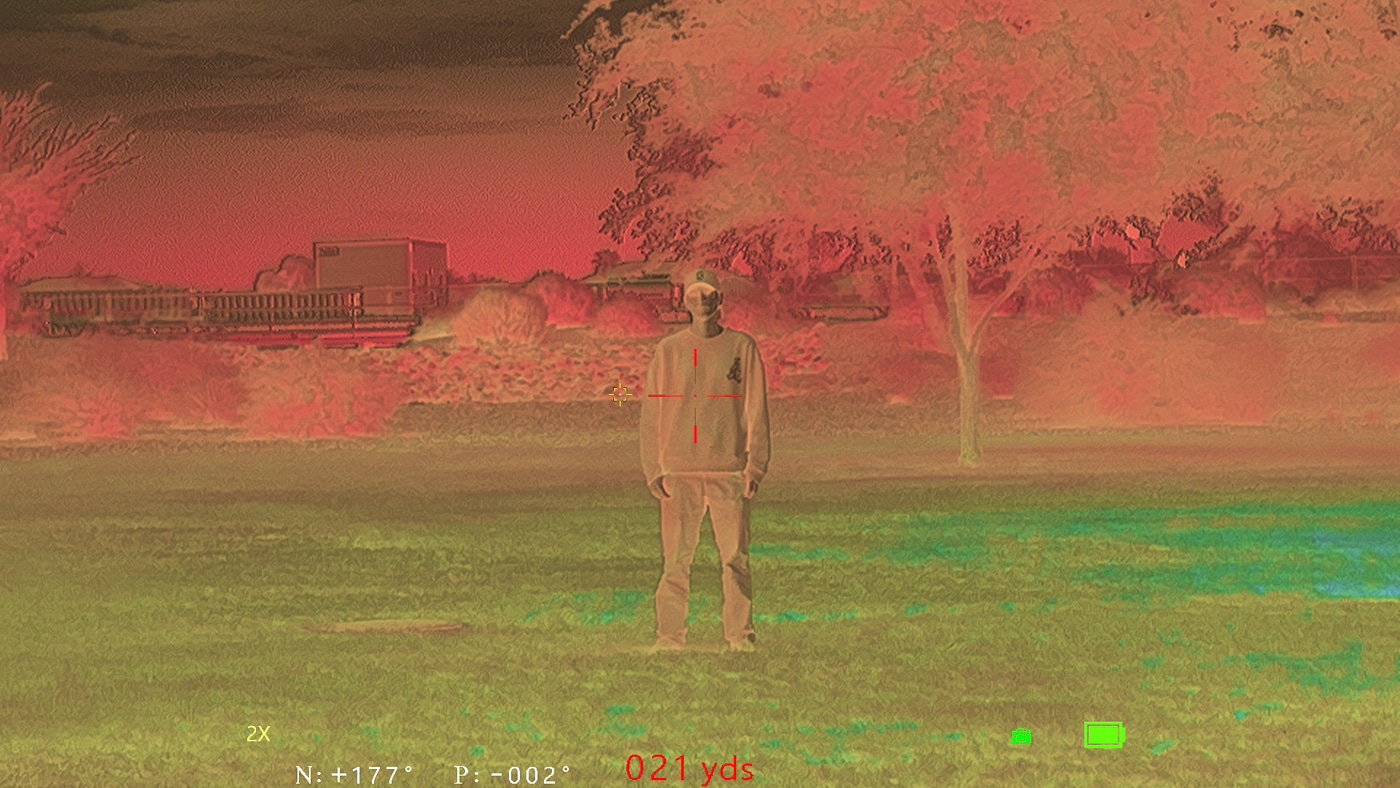 image of man at 2x zoom in field using Shinenyx M1 Pro Fusion Monocular during testing