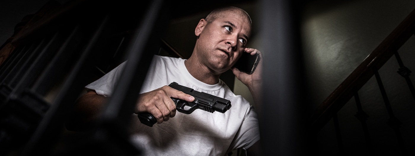man defending his home a night with a Springfield Armory pistol