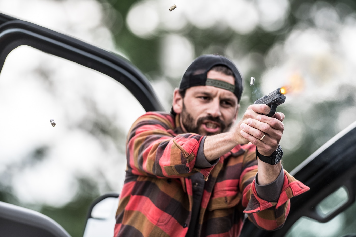 man employing Springfield Armory handgun in a self-defense encounter