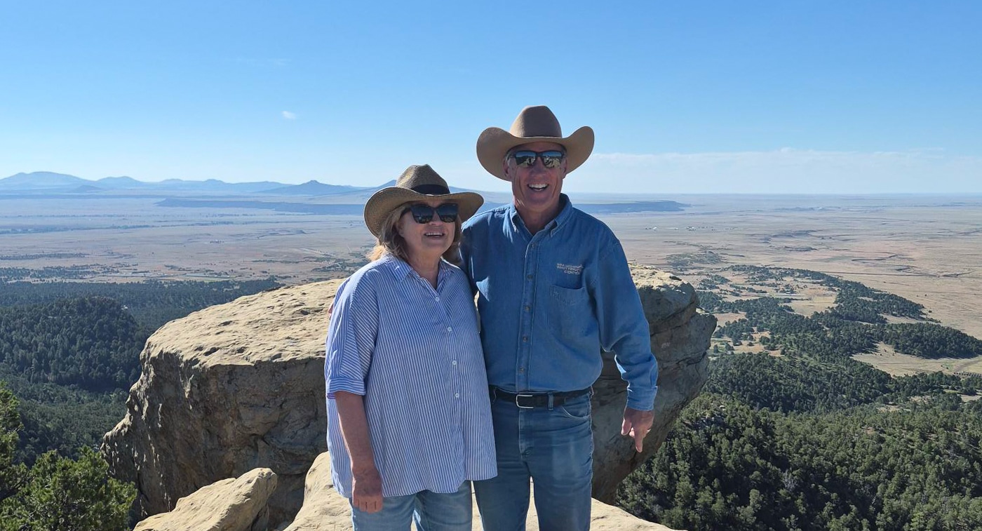 people photographed at the center with beautiful backdrop not on the shooting range