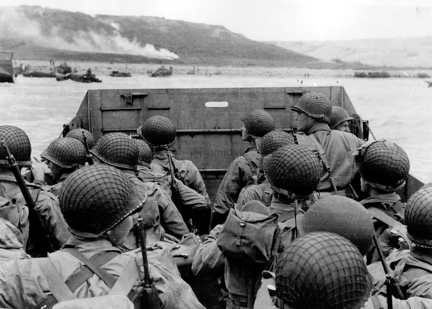 soldiers on landing craft on their way to the beach